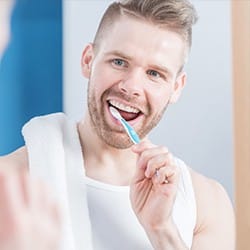 Man brushing teeth