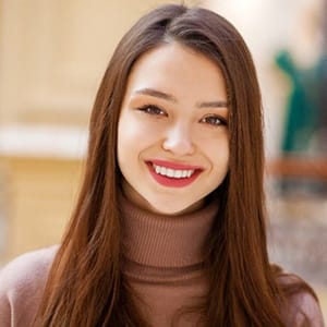 Smiling woman after dental bonding