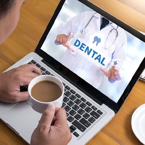 Man learning about dental insurance in Fairfax