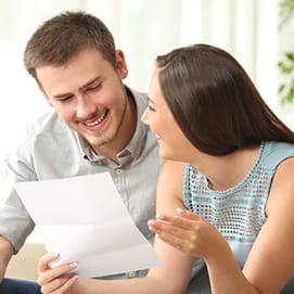 Man and woman smiling together