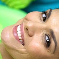 Happy patient who understands the cost of veneers in Fairfax