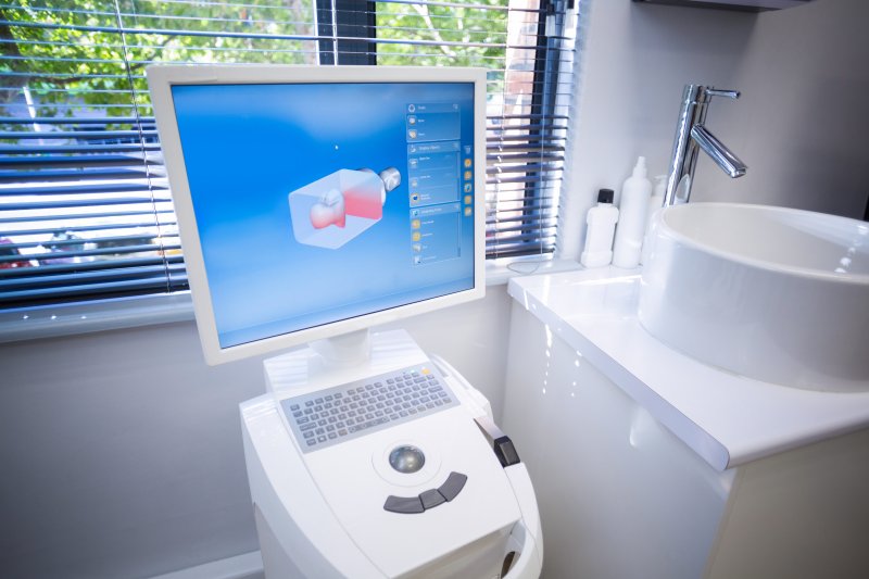 an iTero scanner used to plan for Invisalign in Fairfax in a dentist’s office