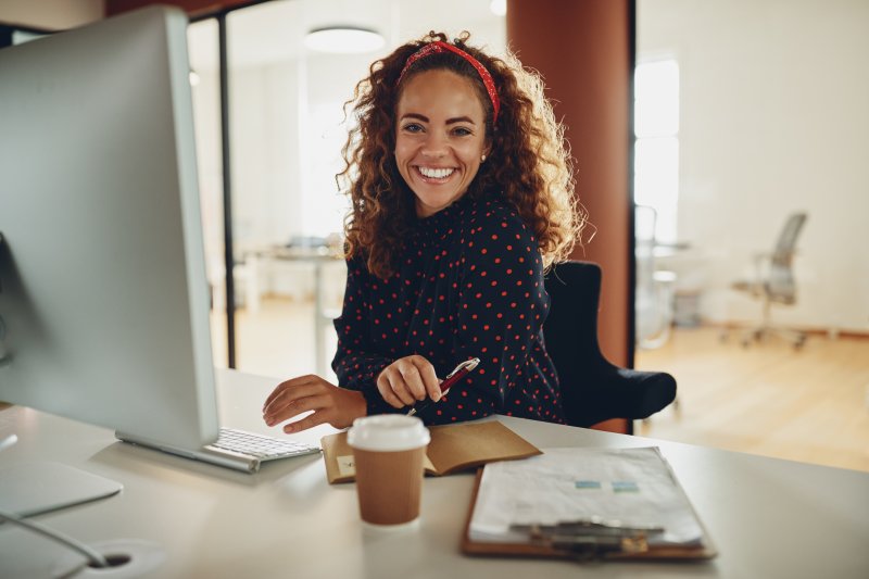 Woman smiling at office